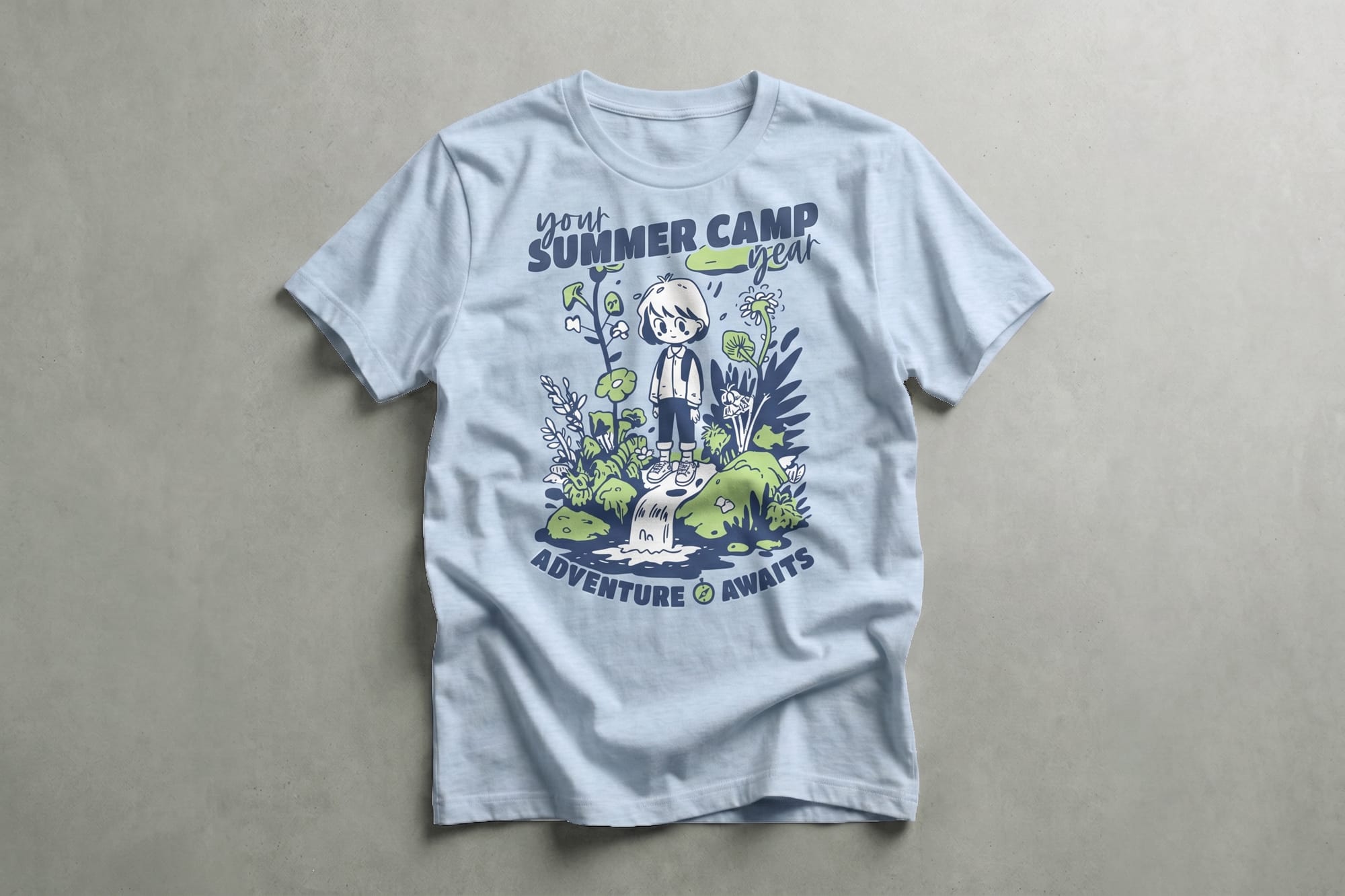 Light blue T-shirt with cartoon graphic of a child in a forest. Text reads "Your Summer Camp Year, Adventure Awaits" in bold navy and green. Playful tone.