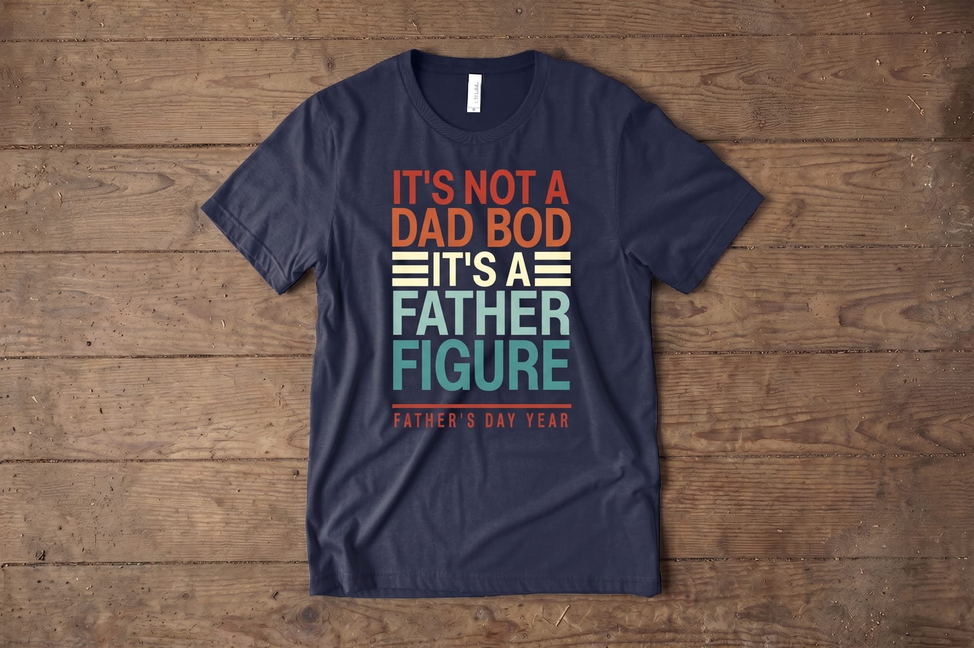 Navy crewneck tee with retro-style custom print reading 'It's Not a Dad Bod It's a Father Figure' — Father's Day gift shirt flatlay