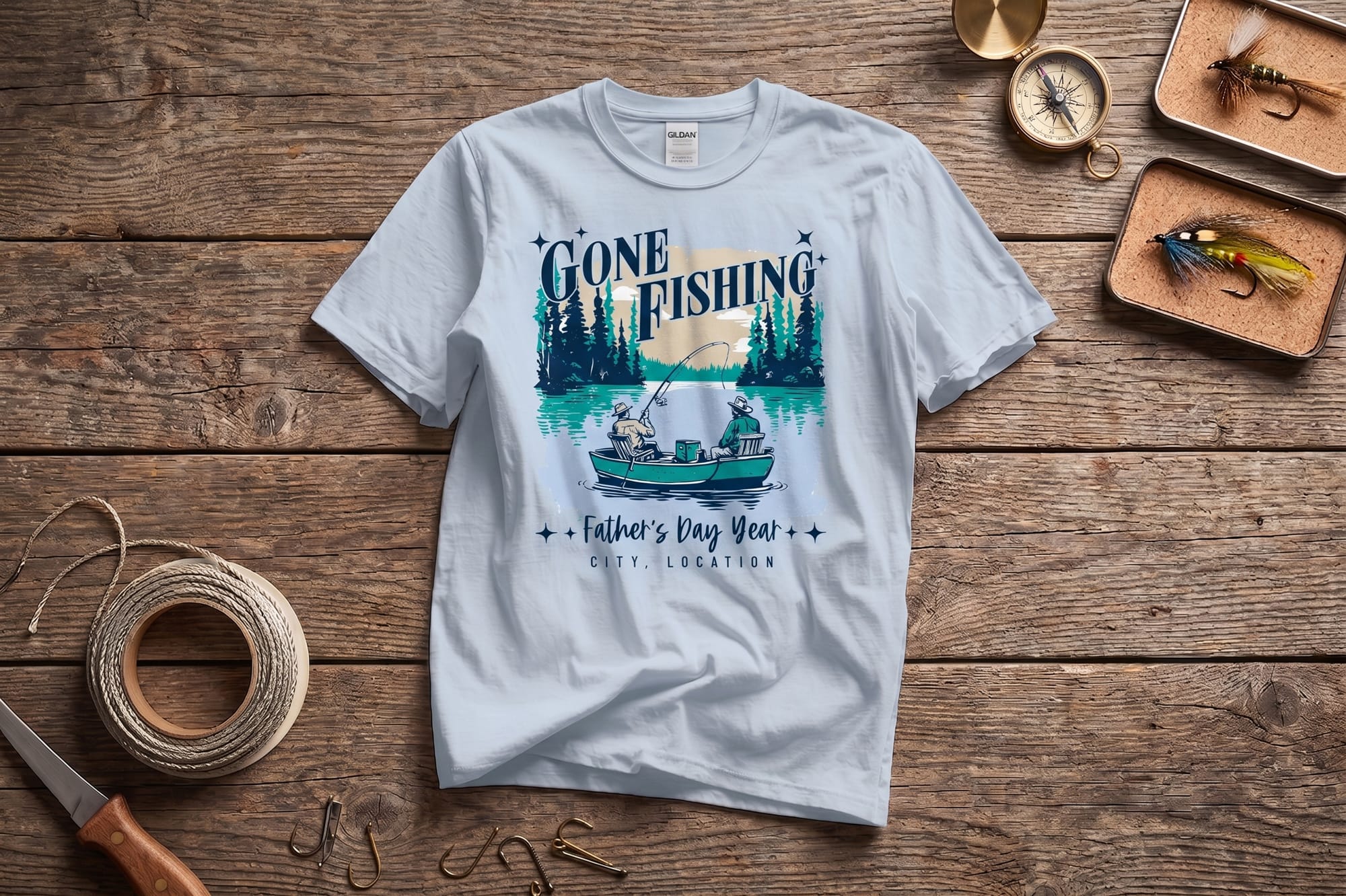 Light blue crewneck tee with a custom-printed 'Gone Fishing' Father's Day design featuring two anglers in a boat