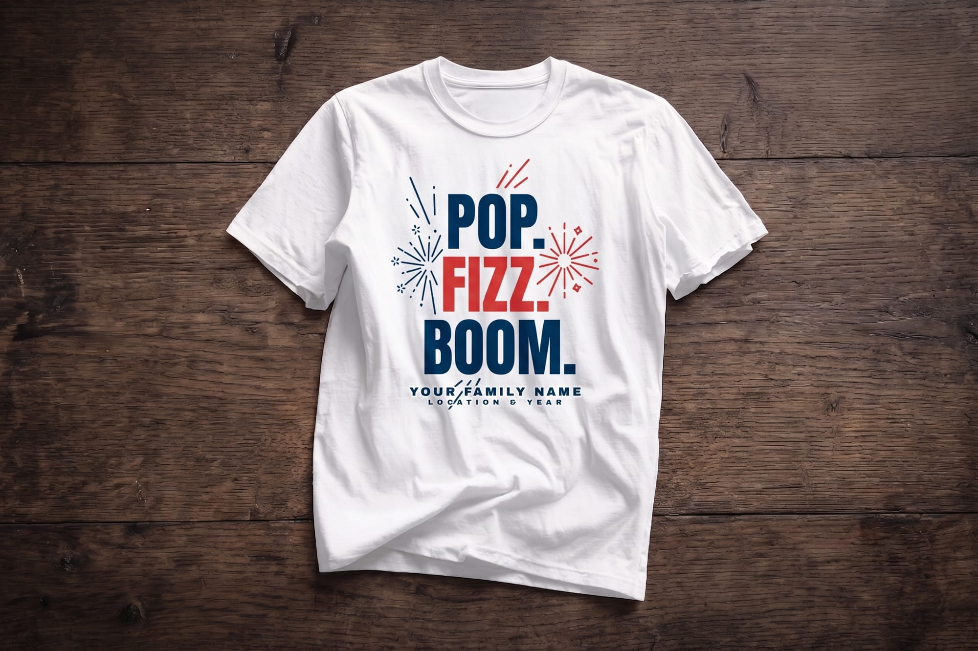 White crewneck tee with red, white, and blue 'Pop. Fizz. Boom.' fireworks design — customizable Fourth of July family reunion shirt