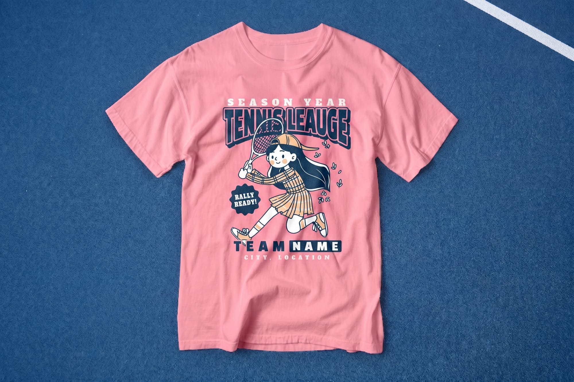 Pink custom tennis league crewneck tee with a retro cartoon girl player and 'Team Name' placeholder text, flatlay on a court