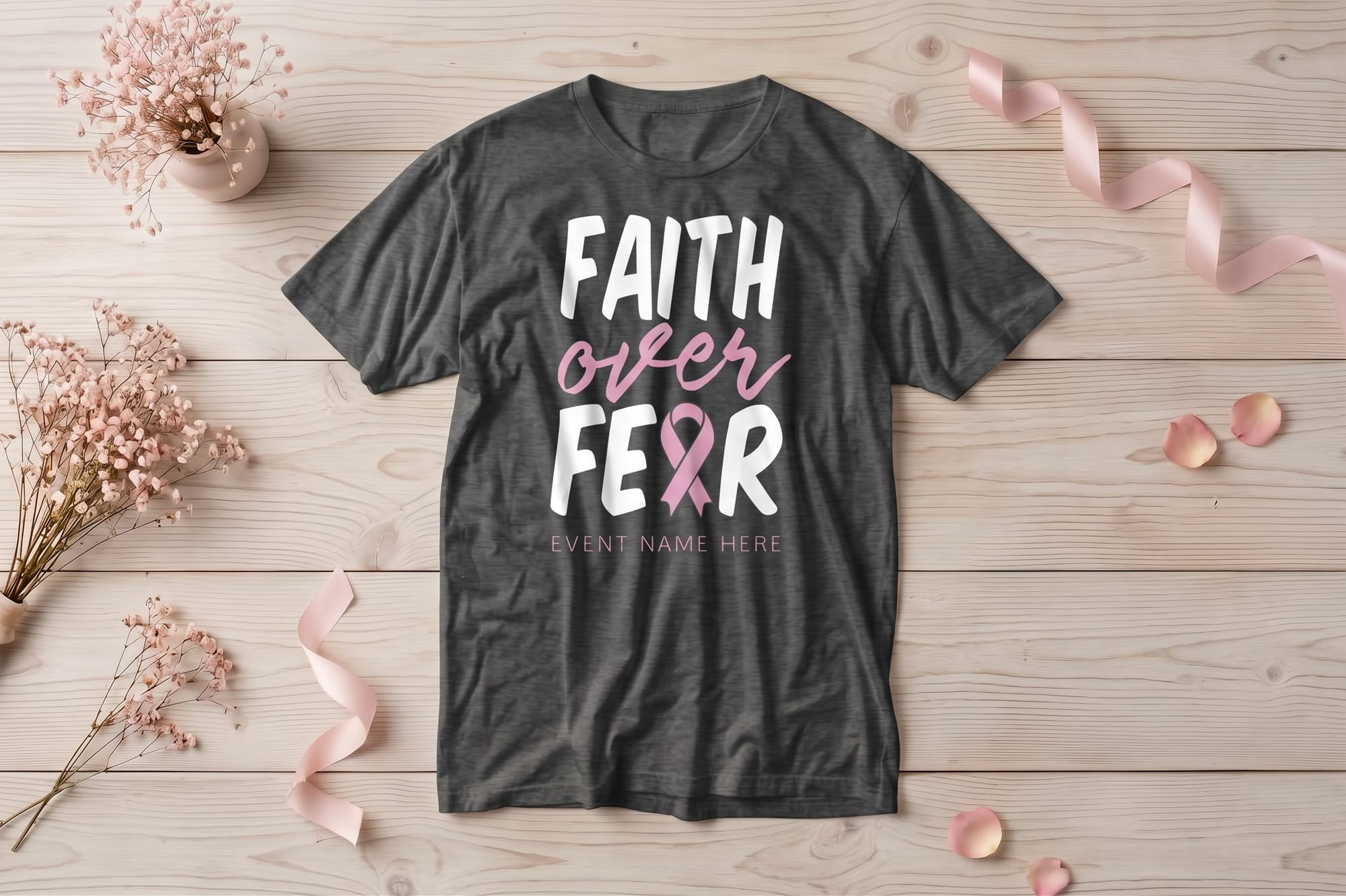 Faith Over Fear t-shirt template with pink script and a ribbon, editable event name