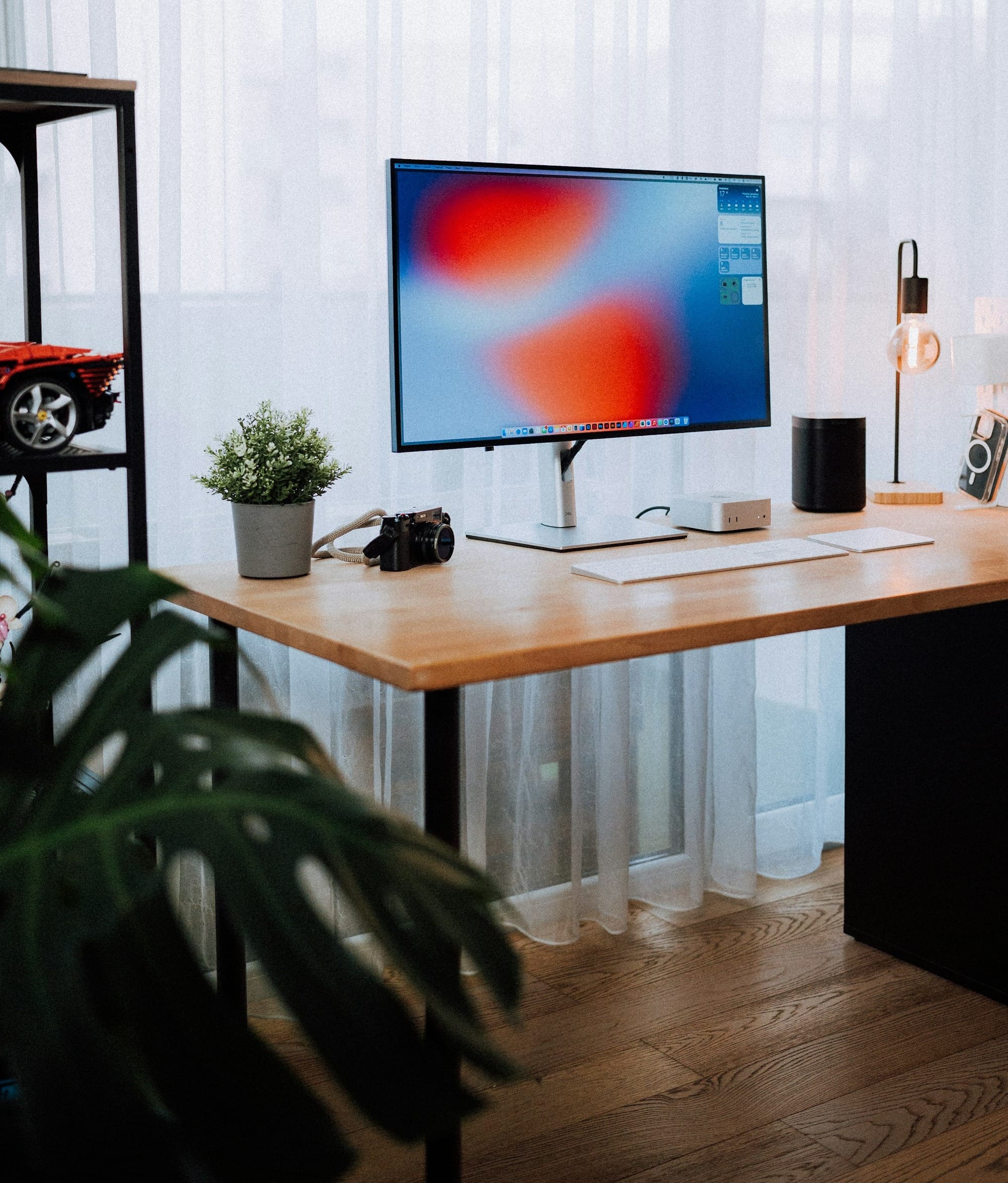 Cozy home office with modern desk setup.