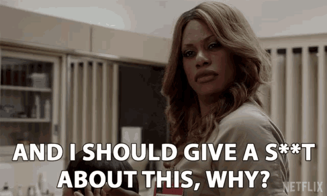 Laverne Cox asking, "and I should give a s**t about this, why?"