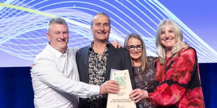 RCG's Ian Hooker, CEO, Steven Waters, Allison Bailie and Caitlin Metz with the Social Impact Award. 