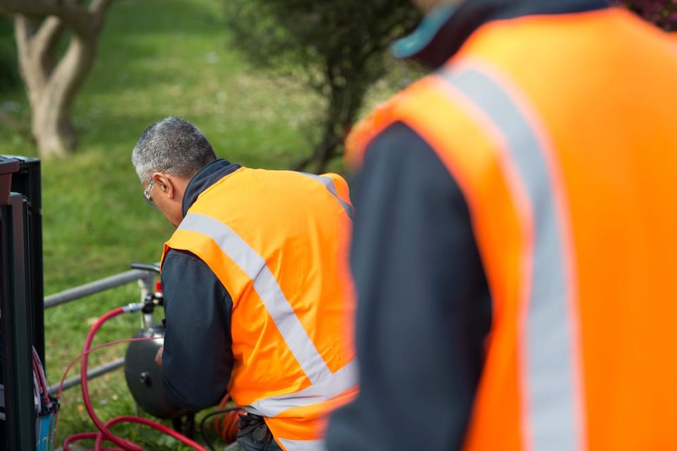 Chorus engineers connecting fibre.