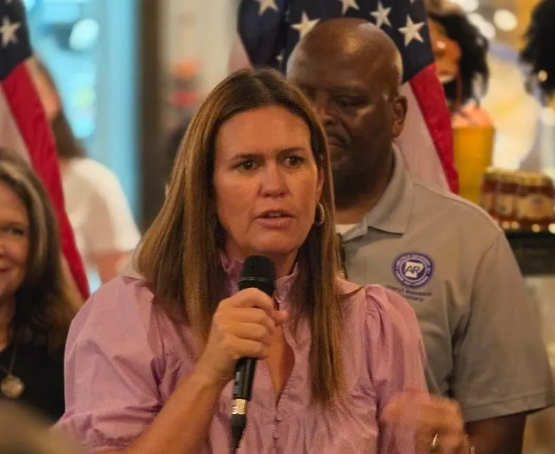 Governor Sarah Huckabee Sanders speaks at a recent event in Arkansas. (Photo courtesy to the Reckonin)