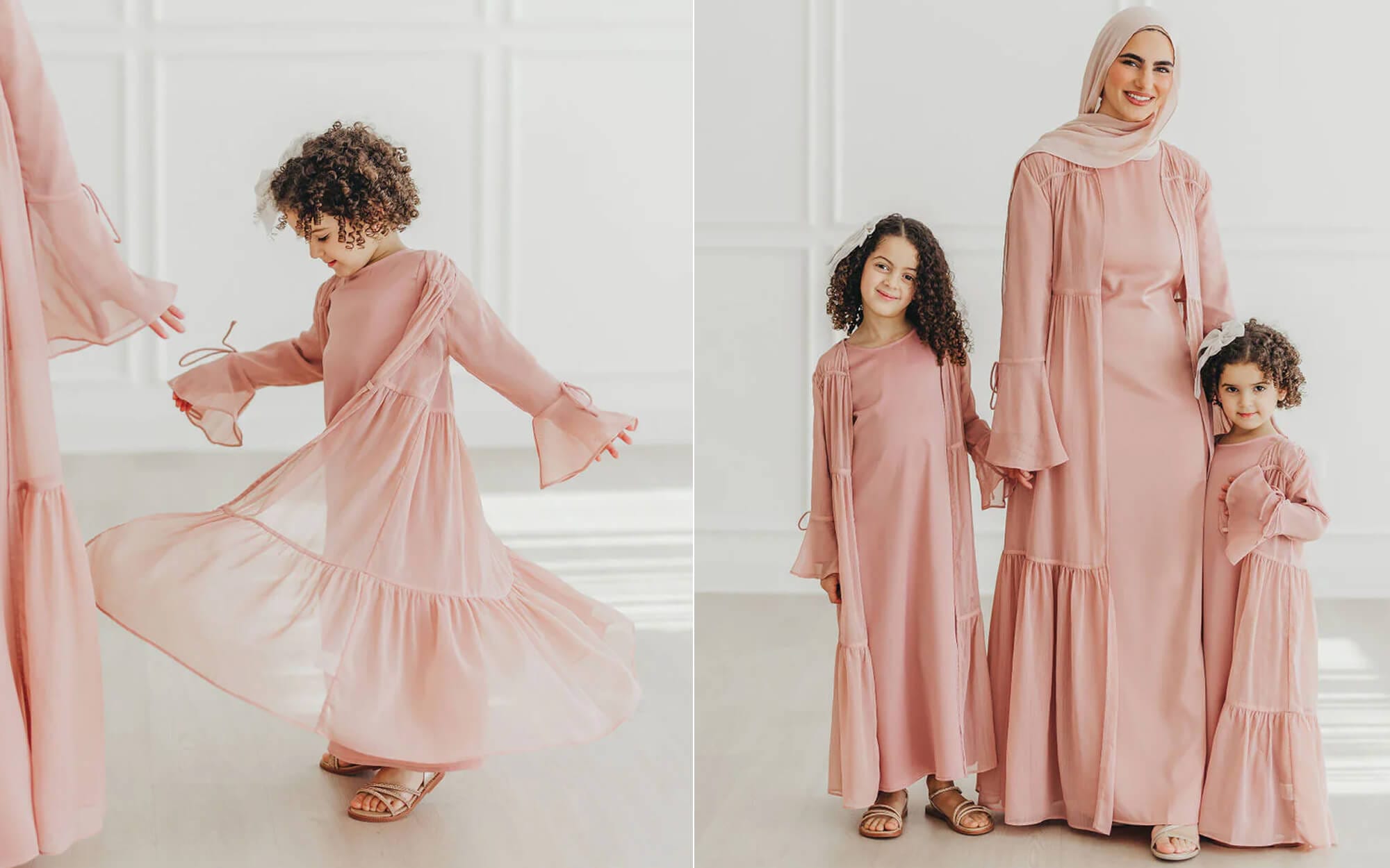 Mother and two young daughters standing together in matching modest, flowing desert-rose dresses in a bright, minimal interior, with one child shown twirling in the same dress in a second frame.