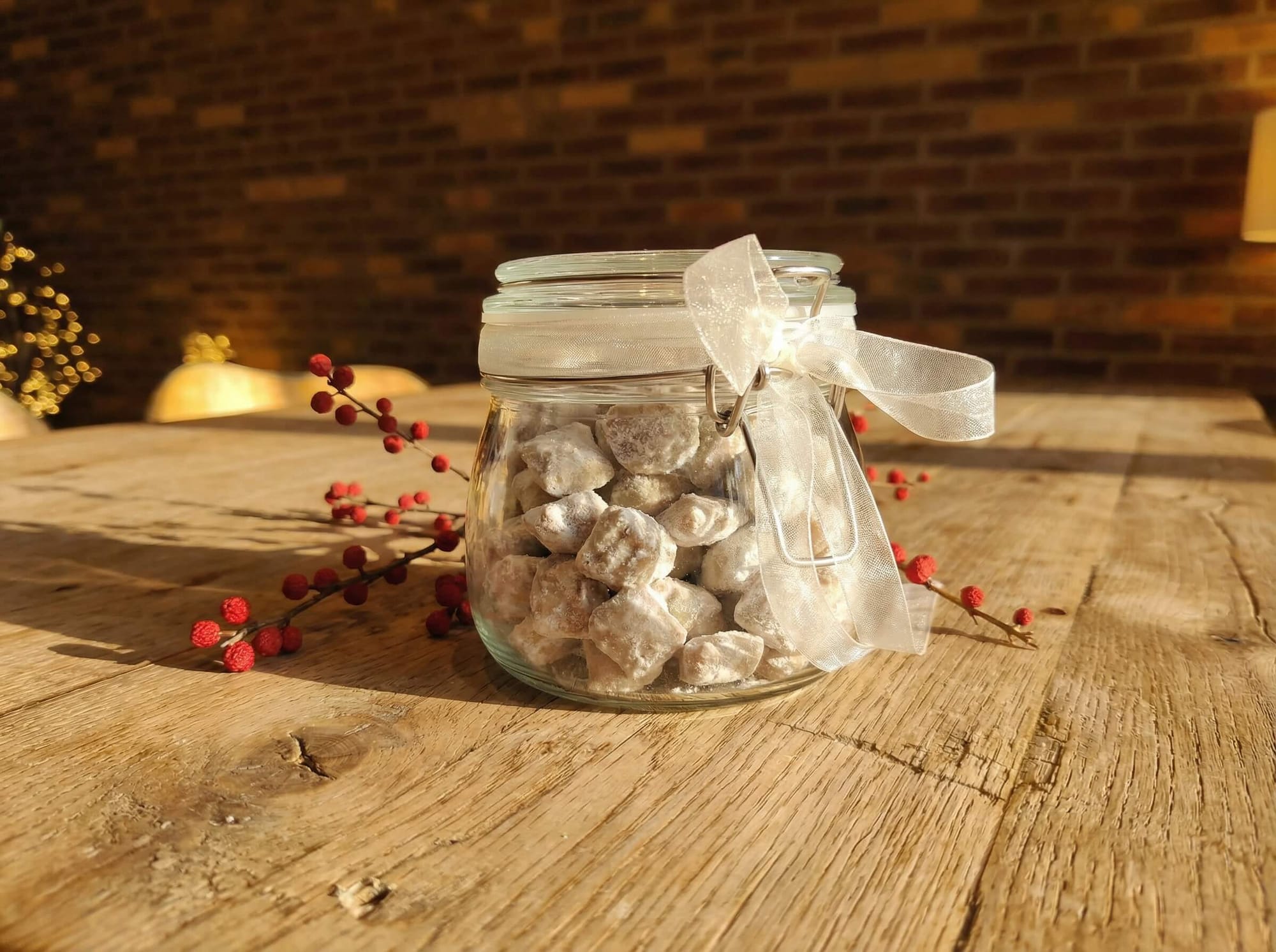 Jar of pistachio Reindeer Chow, dusted with icing sugar