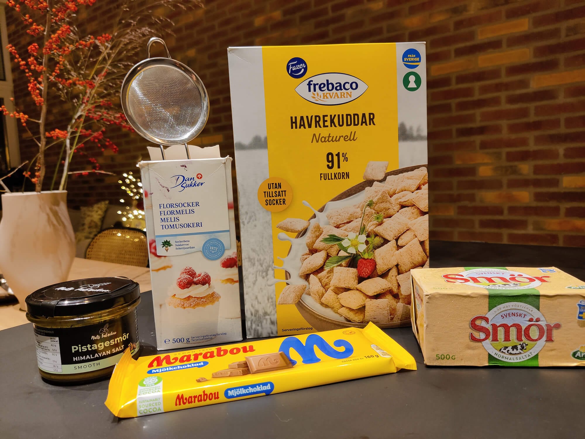 Wholegrain cereal, chopped chocolate, butter and pistachio cream arranged for making pistachio Puppy Chow