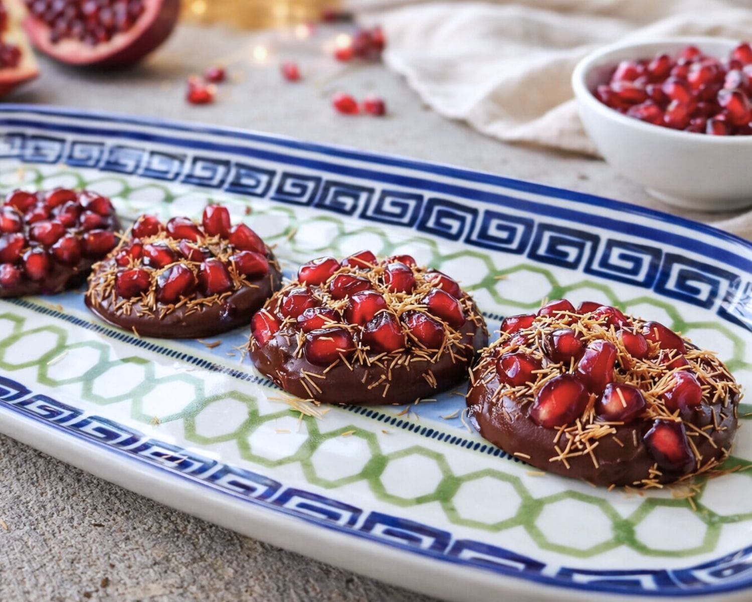 Pomegranate chocolate bites with crisp kataifi topping