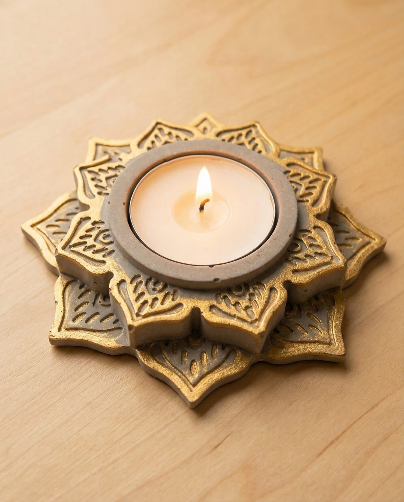 Elegant concrete candleholder with Islamic geometric pattern and gold details for Ramadan decor