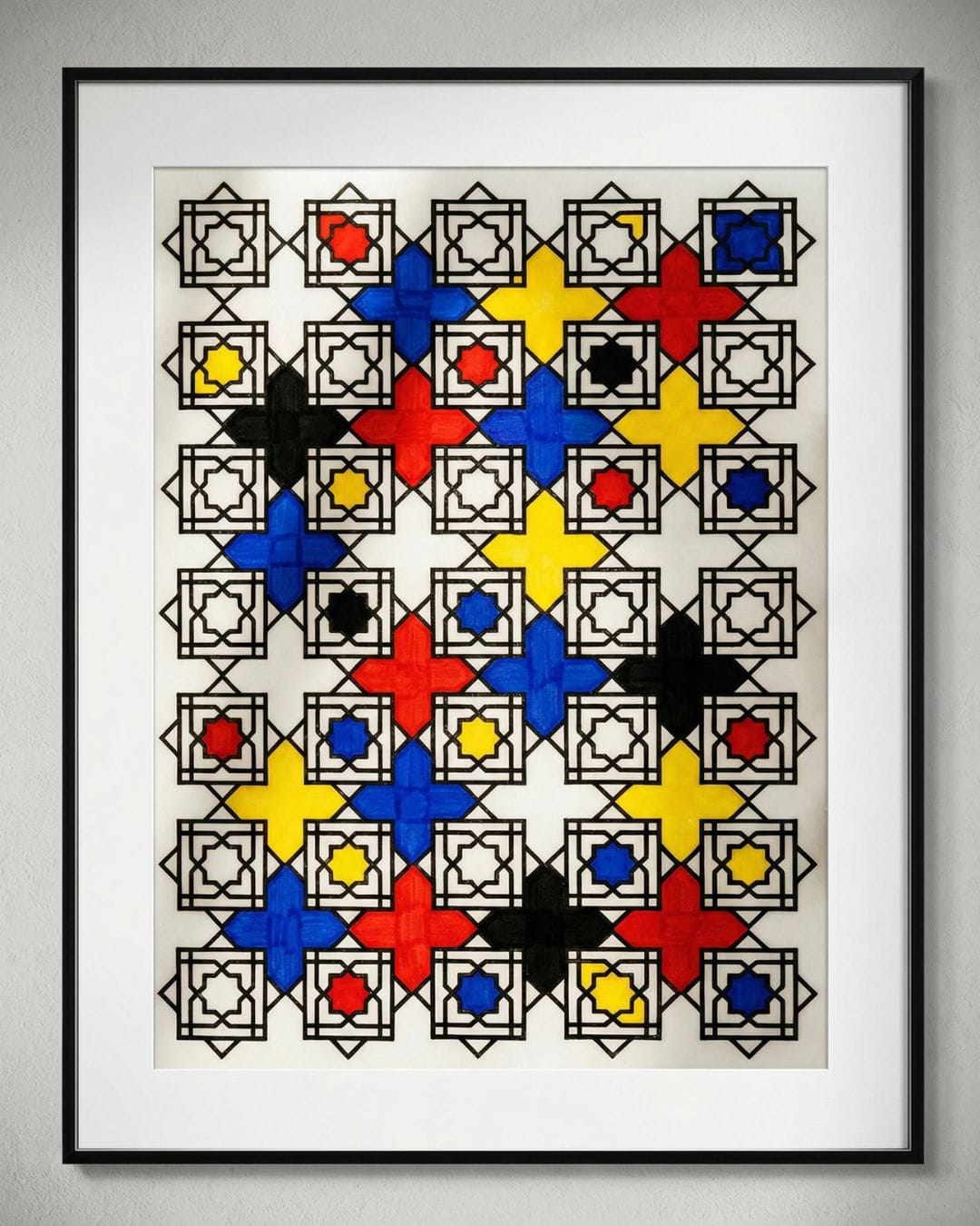 Framed Mondrian-inspired geometric wall art created with Islamic pattern stamps and primary colours