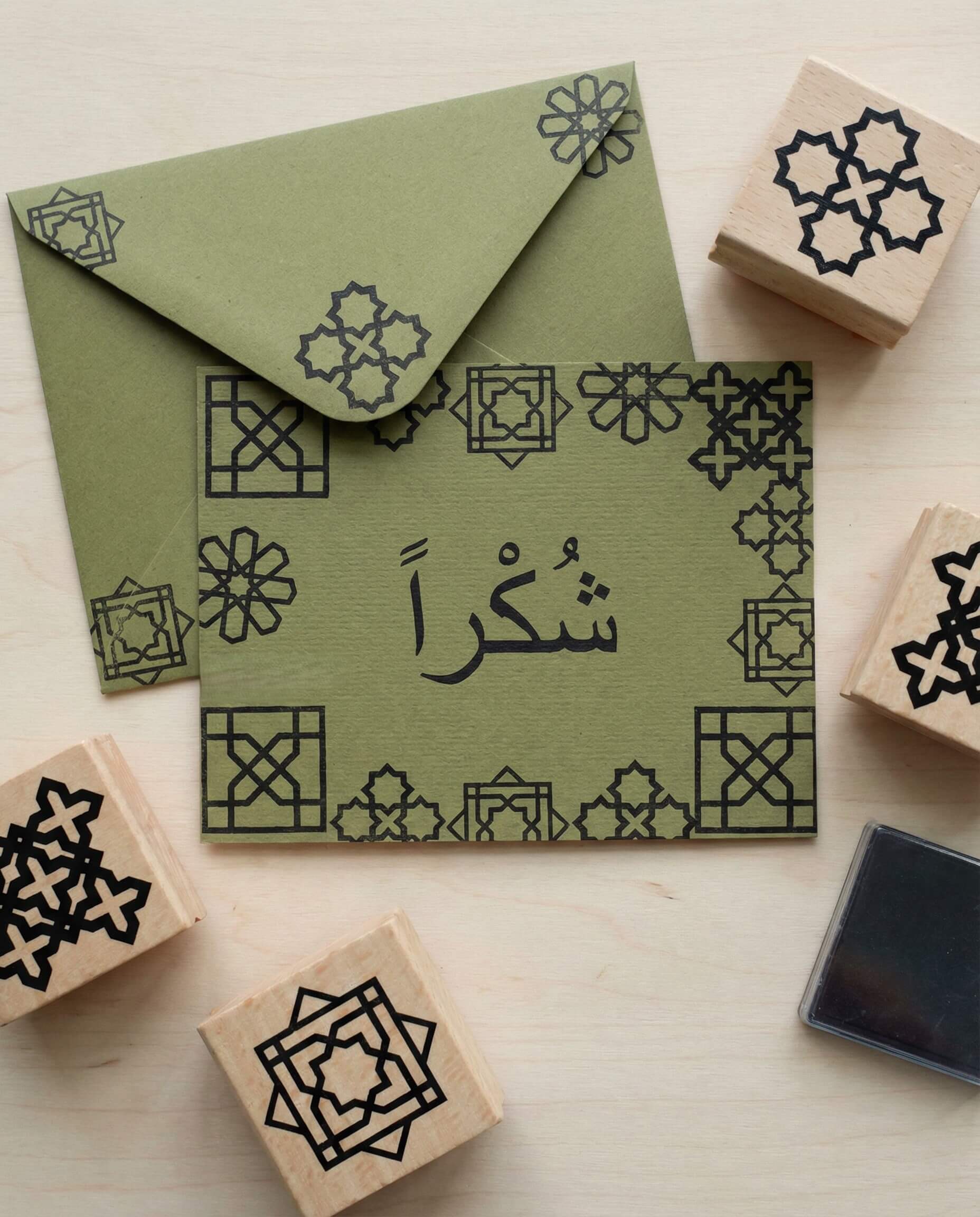 Islamic geometric patterns stamped on postcards and envelopes for simple DIY paper projects.