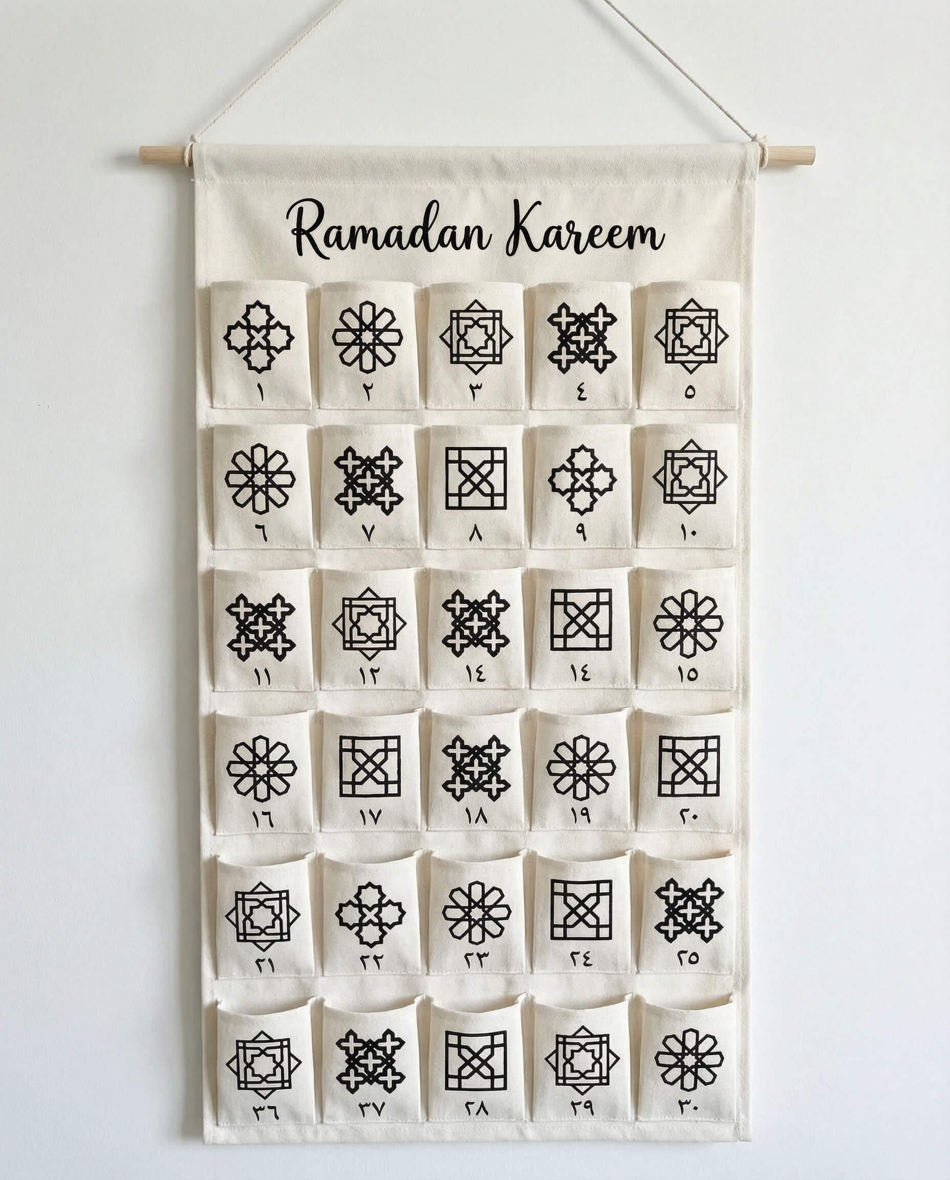 Ramadan calendar made with Islamic geometric pattern stamps on fabric wall hanging