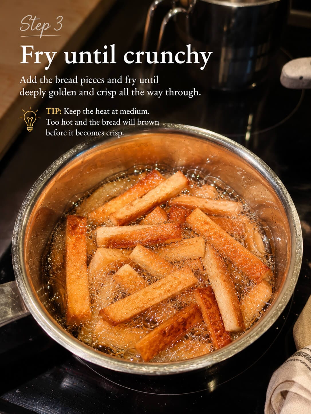 Leftover bread crusts frying in oil until golden and crispy for homemade bread bites recipe.