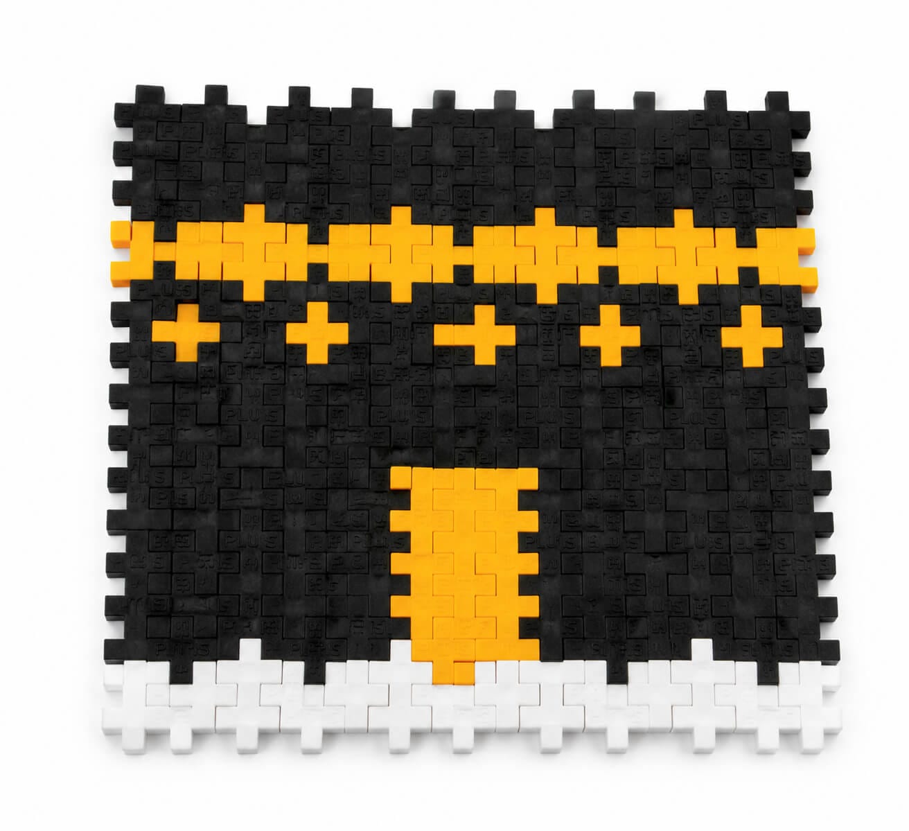 Minimal Kaaba-inspired design made with black, gold, and white Plus-Plus pieces for an Islamic kids craft activity.