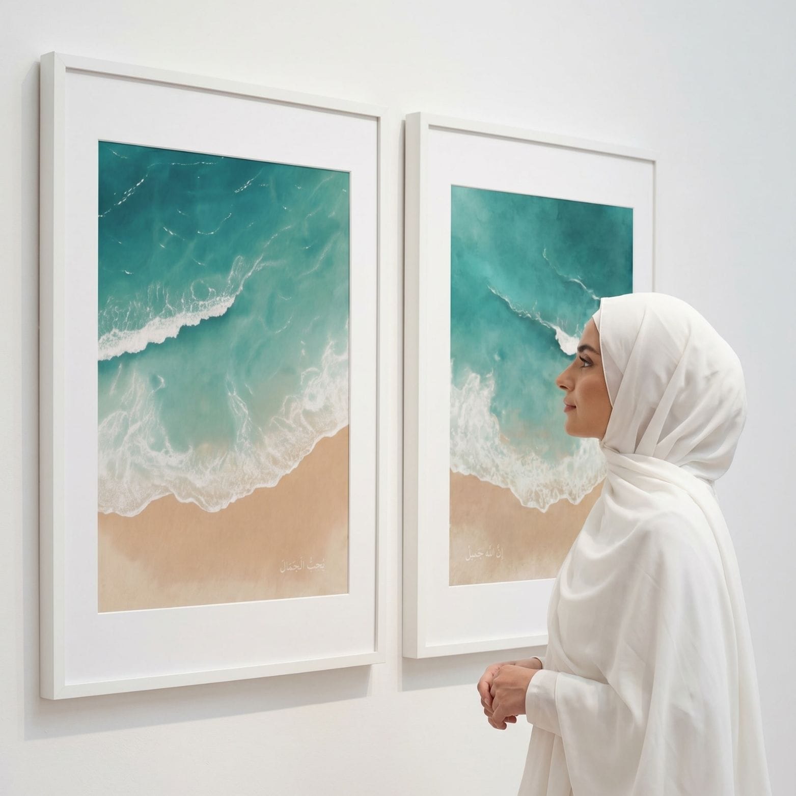 Woman in a white hijab viewing two framed ocean-inspired Islamic wall art prints with Arabic text from the hadith “Allah is beautiful and loves beauty.”