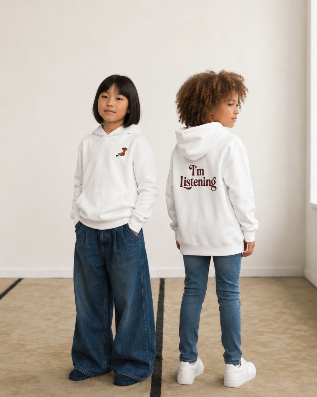 Youth wearing white Deenista hoopoe hoodies inspired by the story of Prophet Suleiman.