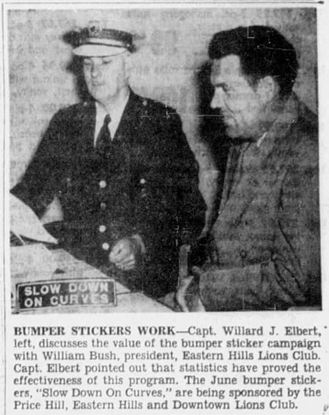 Newspaper clip of a bumper sticker reading "Slow down on curves"