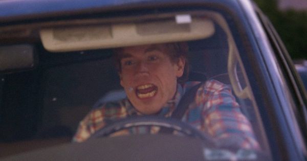 Conner O'Malley honking a car horn