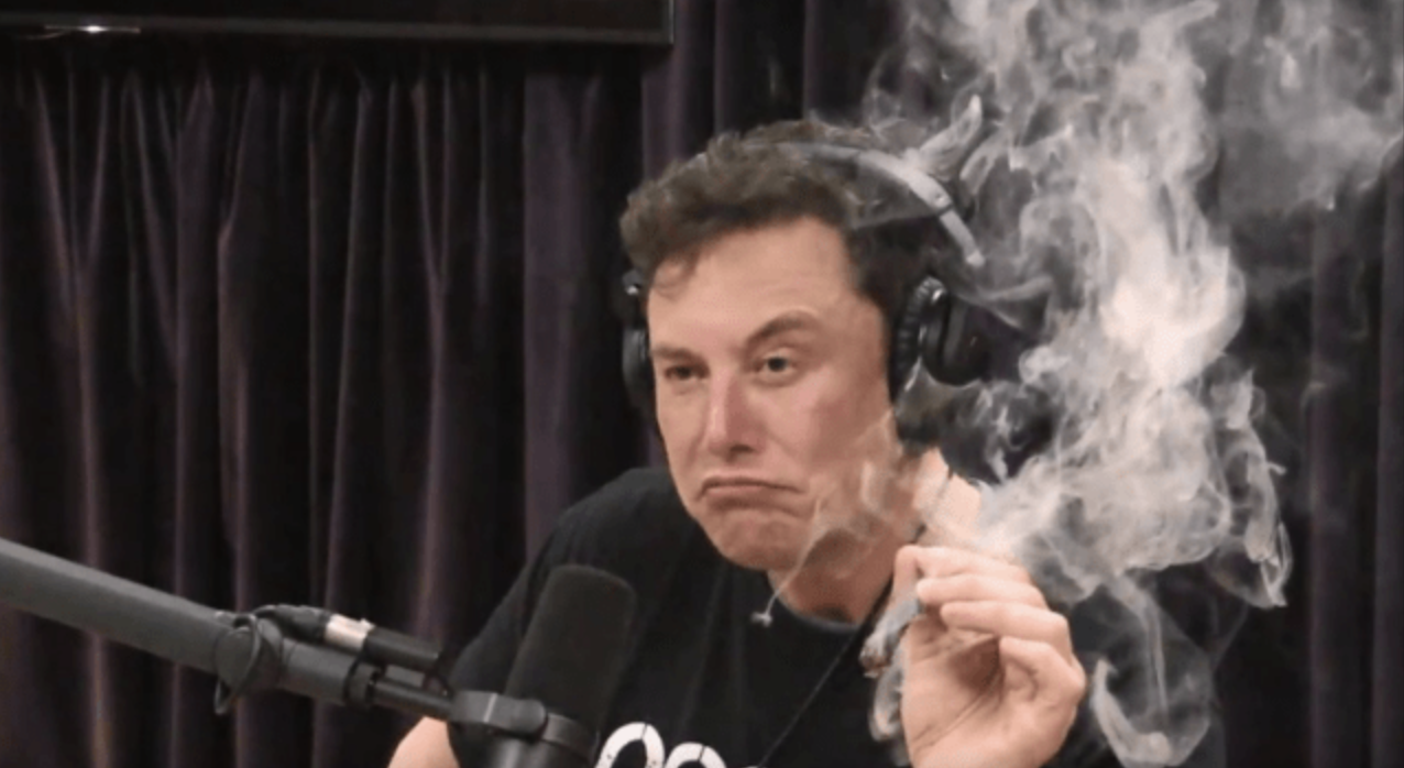 Elon Musk seen in a cloud of smoke during a Joe Rogan show appearance