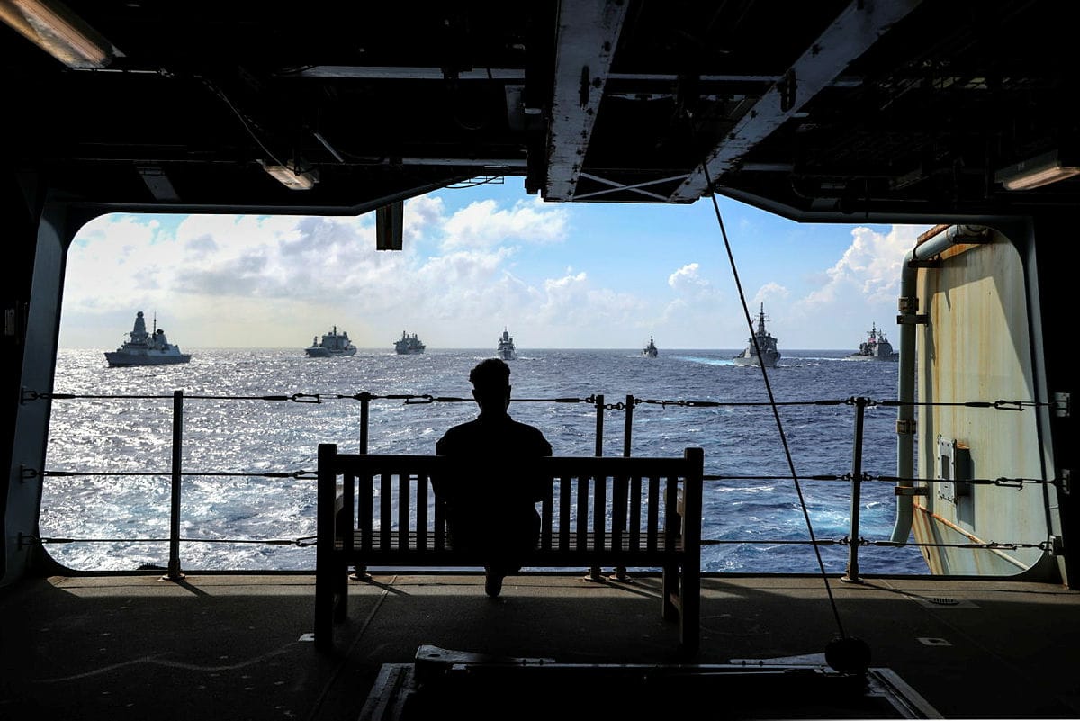 File pic of the ship's company of HMS Queen Elizabeth looking out to sea (Image: UK MOD © Crown copyright 2022)