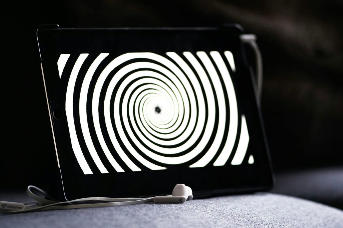 Do large language models have a huge problem with hypnosis? (Photo by MK Hamilton on Unsplash)