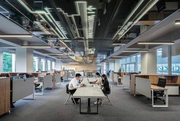 Will agents enable organisations to do more work with fewer staff? (Photo by LYCS Architecture on Unsplash)