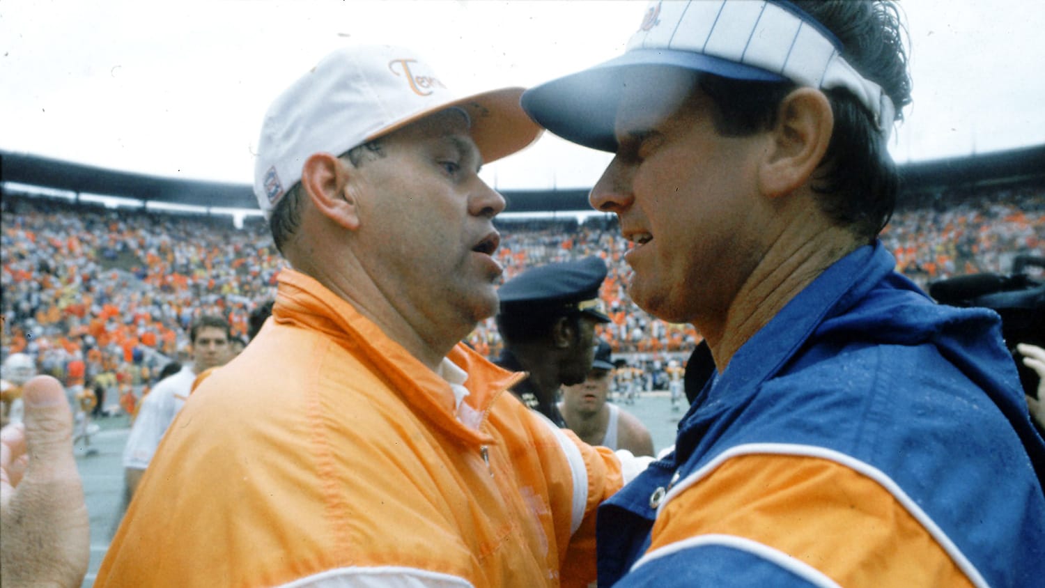 Tennessee coach Phillip Fulmer (left) and Florida coach Steve Spurrier (right) embrace after the Tennessee beat Florida 31-14 at Neyland Stadium on Saturday, Sept.19, 1992.