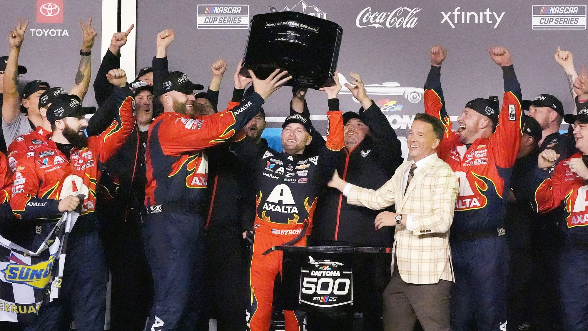 William Byron lifts the Harley J. Earl Trophy in Victory Lane, Sunday, Feb. 16, 2025 after winning the Daytona 500 at Daytona International Speedway.