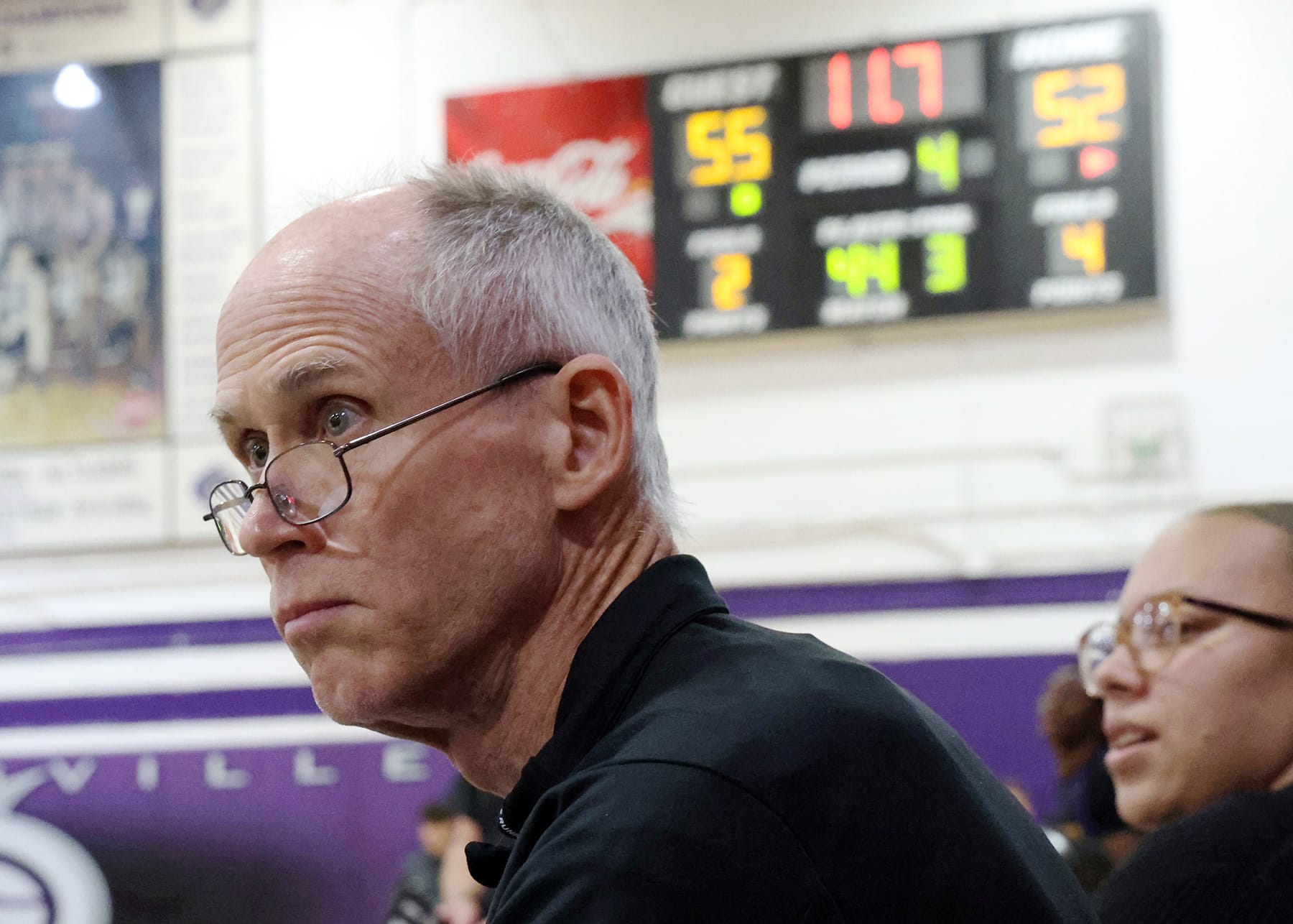John Wilson watches intensely as Gainesville High School faces Columbia High School in the school’s gymnasium Dec. 2, 2025.
