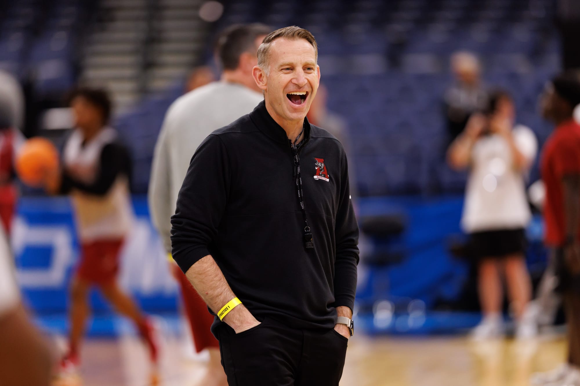 Mar 19, 2026; Tampa, FL, USA; Alabama Crimson Tide head coach Nate Oats smiles during a practice session ahead of the first round of the men's 2026 NCAA Tournament at Benchmark International Arena.
