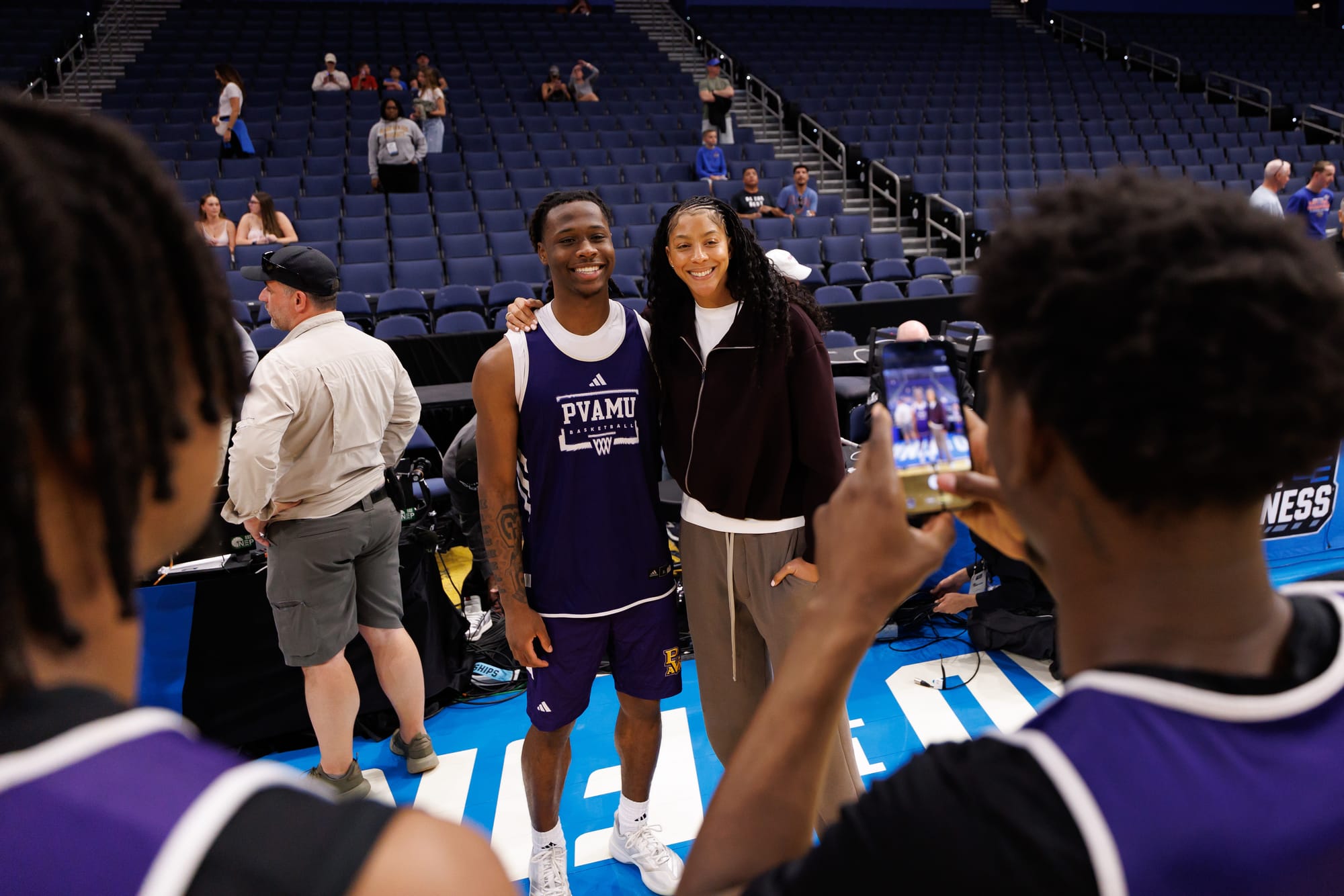 Mar 19, 2026; Tampa, FL, USA; Prairie View A&M Panthers forward Seryee Lewis (15) poses with former WNBA player Candace Parker during a practice session ahead of the first round of the men's 2026 NCAA Tournament at Benchmark International Arena.