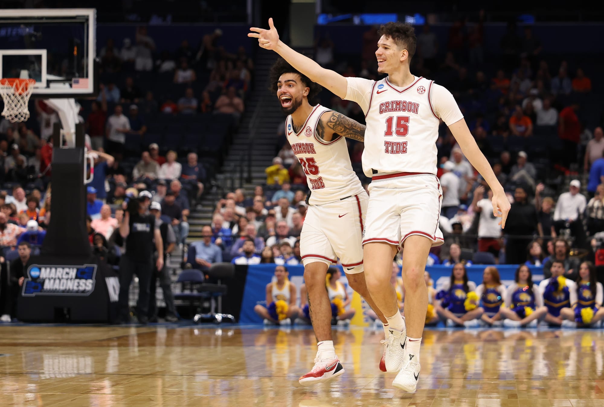 Mar 20, 2026; Tampa, FL, USA; Alabama Crimson Tide guard Houston Mallette (95) and center Noah Williamson (15) celebrate in the second half against the Hofstra Pride during a first round game of the men's 2026 NCAA Tournament at Benchmark International Arena.