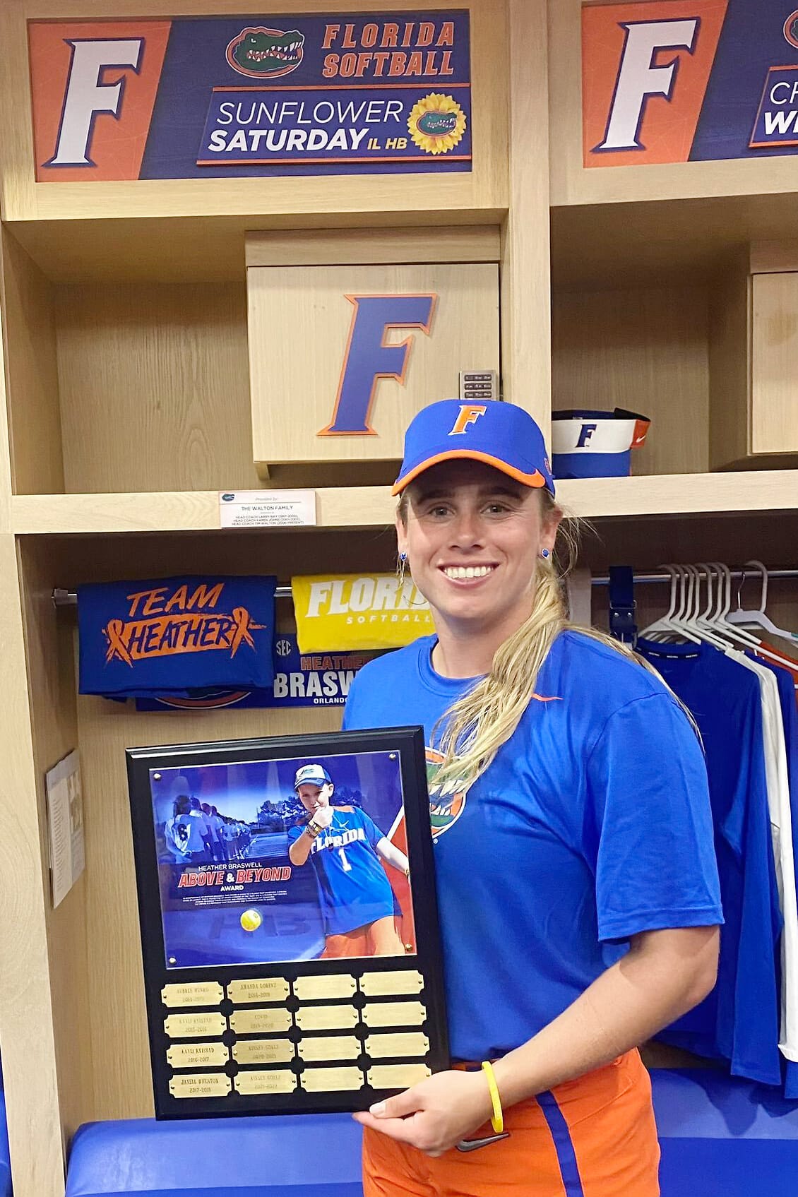 In Heather’s honor, the team created the 'Heather Braswell Above and Beyond Award.' Kinsey Goelz, shown here in front of Heather's honorary locker, won it in 2023.