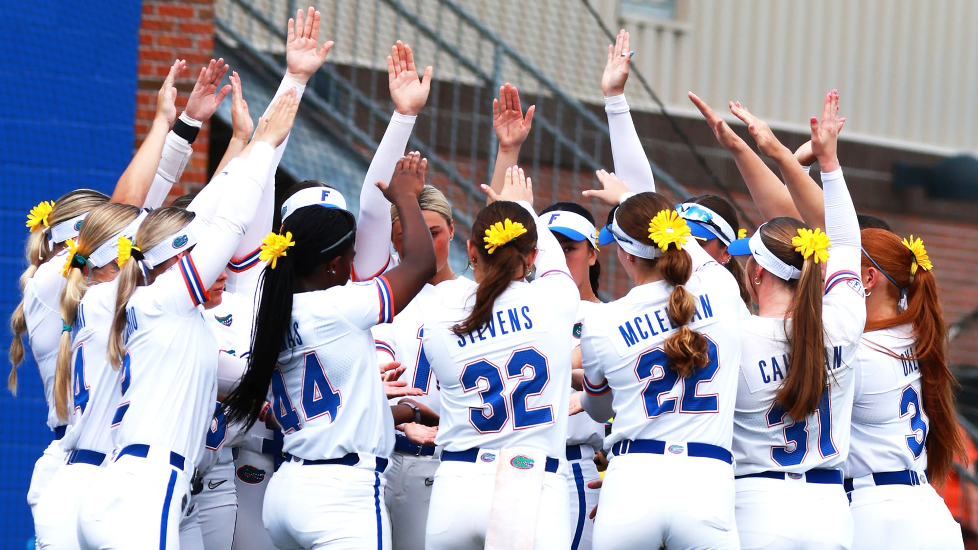 Florida softball players raise their hands to do the Gator chomp  before Florida’s game against Missouri at Katie Seashole Pressly Stadium in Gainesville, Fla., on Saturday, March 7, 2026