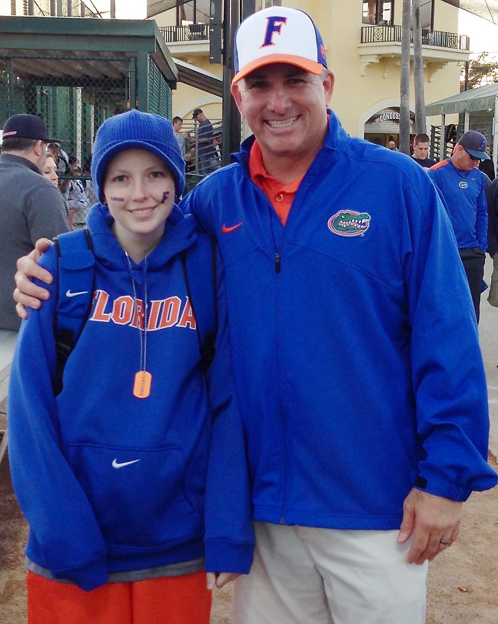 Heather Braswell and Florida coach Tim Walton pose with one another after an early-season tournament. 