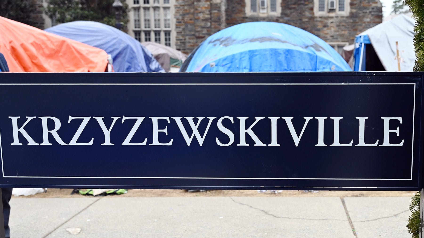 Tents are set up in front of the Krzyzewskiville sign on the Duke campus prior to a game against Virginia at Cameron Indoor Stadium. 