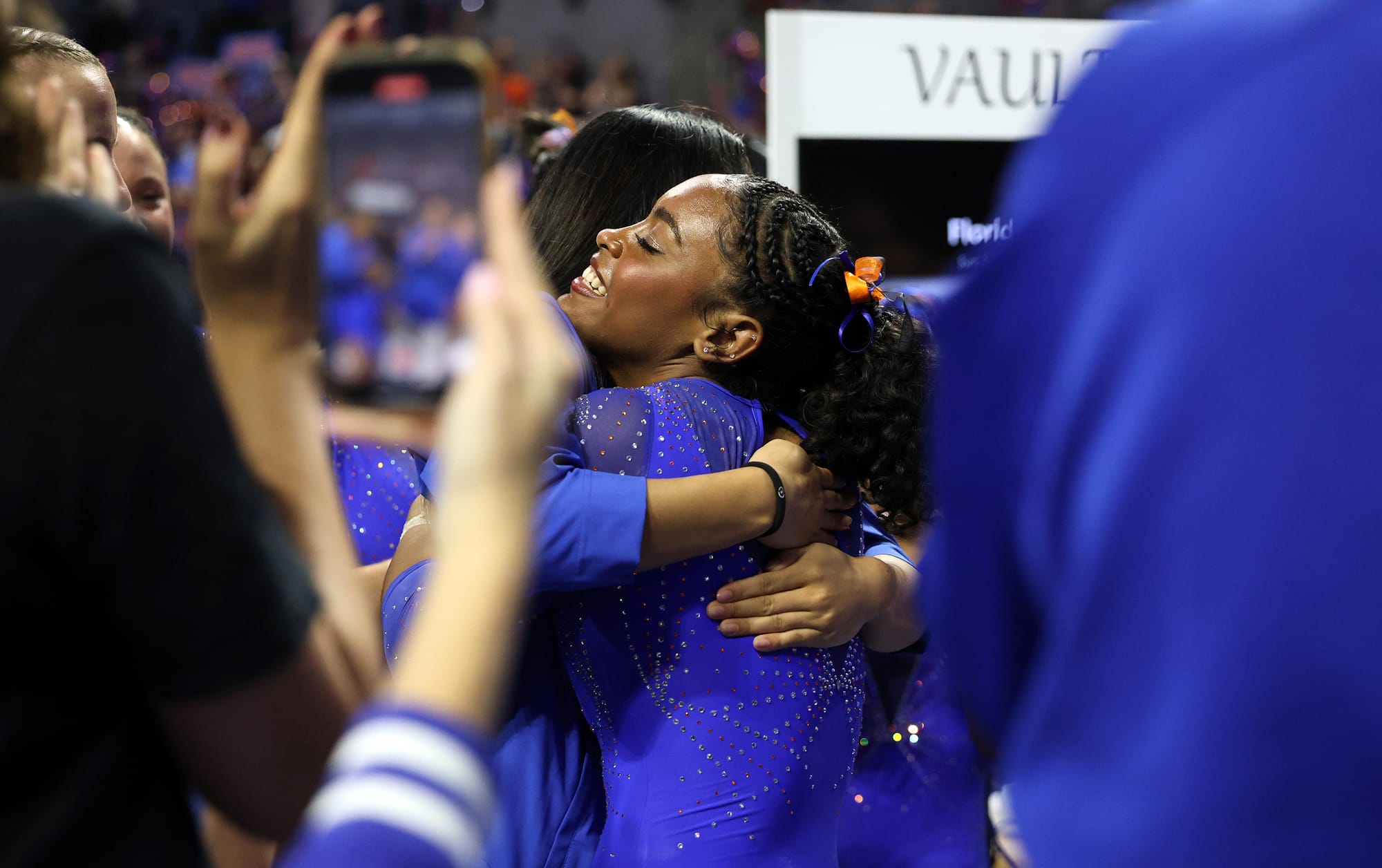 Selena Harris-Miranda celebrates with her team during Florida's gymnastics meet against LSU on Sunday, March 8, 2026, at the O’Connell Center in Gainesville, Fla.