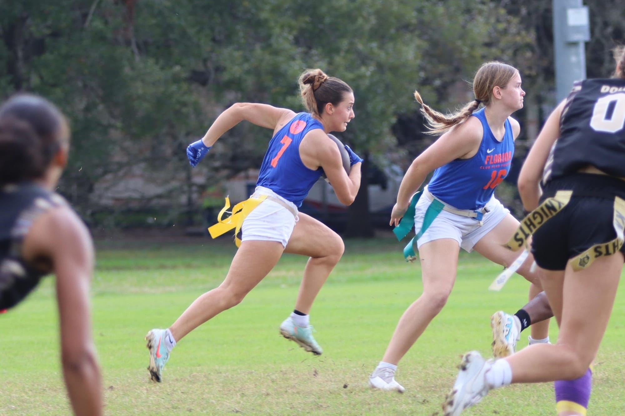 A Florida club women's flag football player runs during the National Intramural and Recreational Sports Association national championship in January 2026.