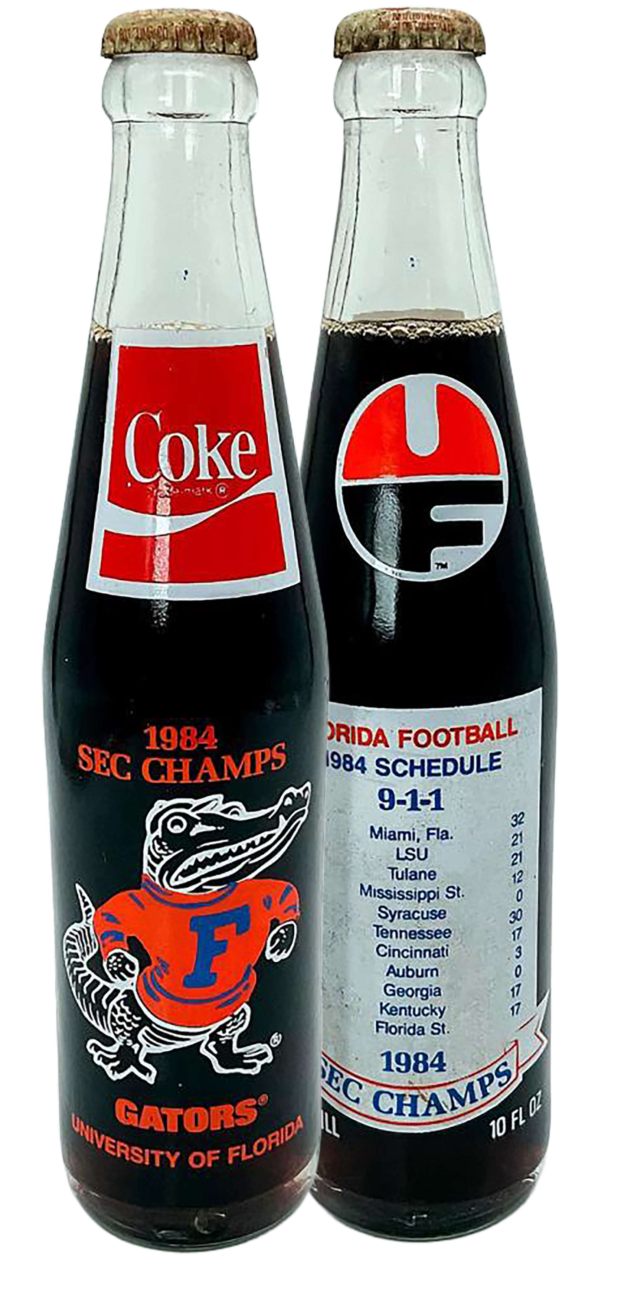 A pair of the Coke bottles sold after Florida's 1984 SEC championship sitting on a table in 2025 in Gainesville, Florida.