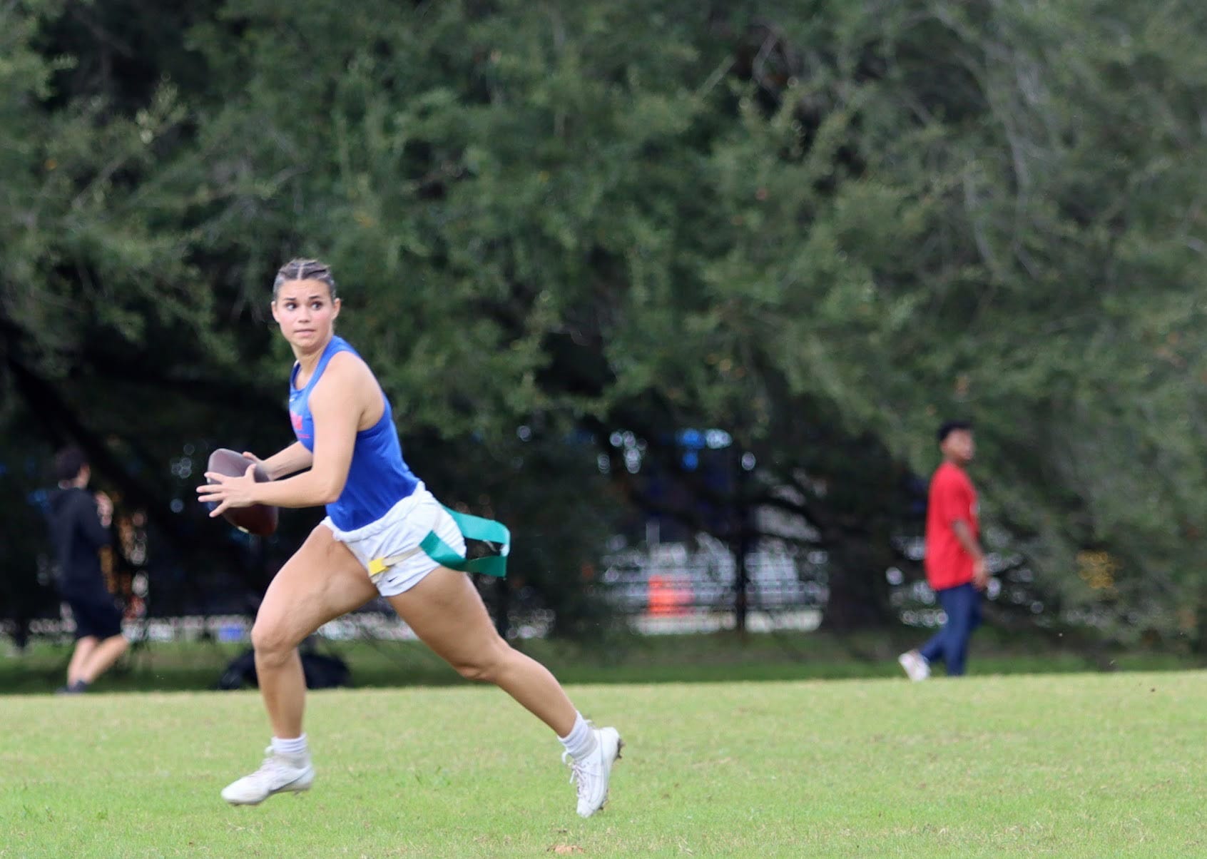 Florida's club women's flag football's captain and quarterback Mieke Rowe prepares to throw during a game at the National Intramural and Recreational Sports Association national championships against UCF in January 2026.