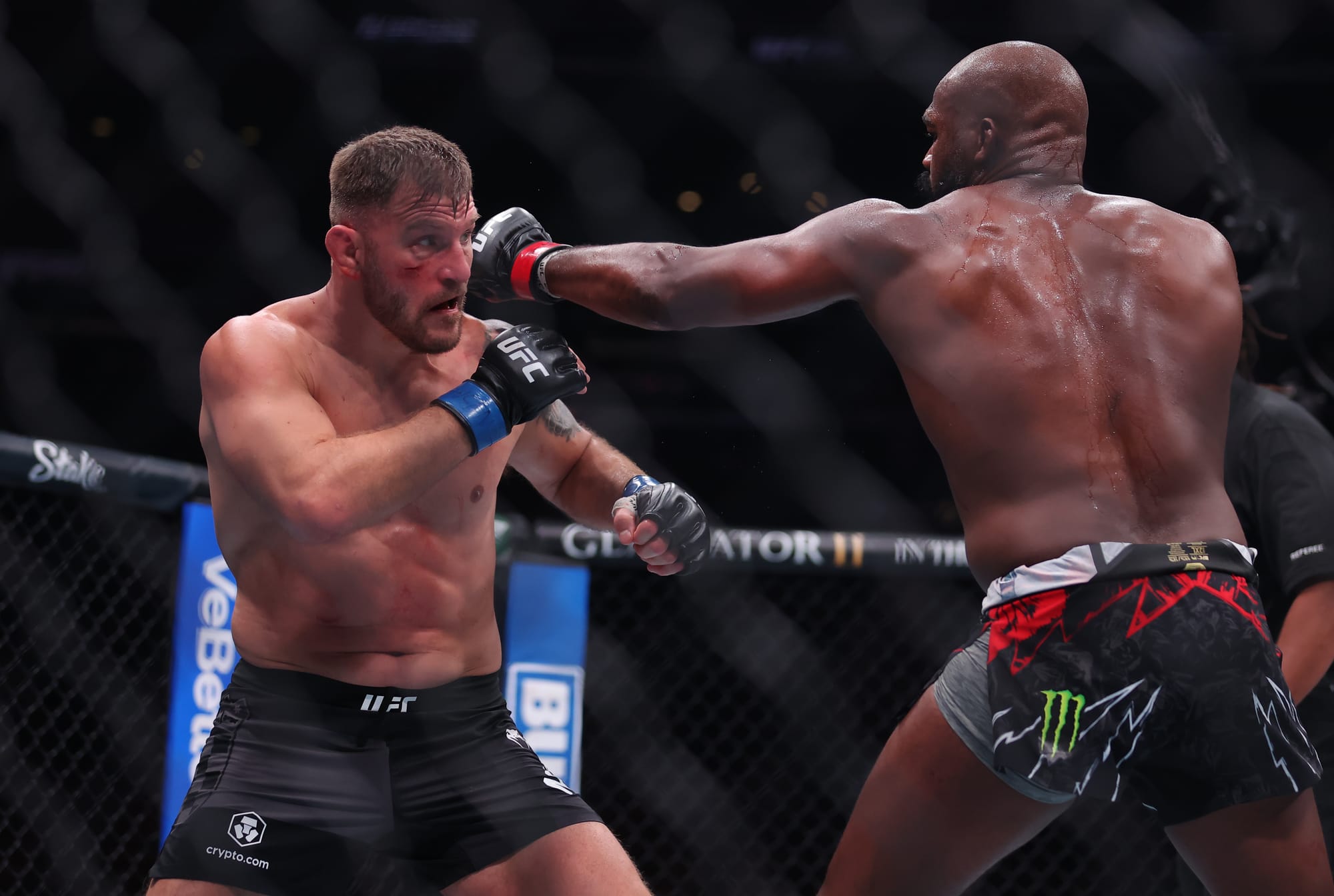 Nov 16, 2024; New York, NY, USA; Jon Jones (red gloves) fights Stipe Miocoic (blue gloves) in the heavyweight bout during UFC 309 at Madison Square Garden.