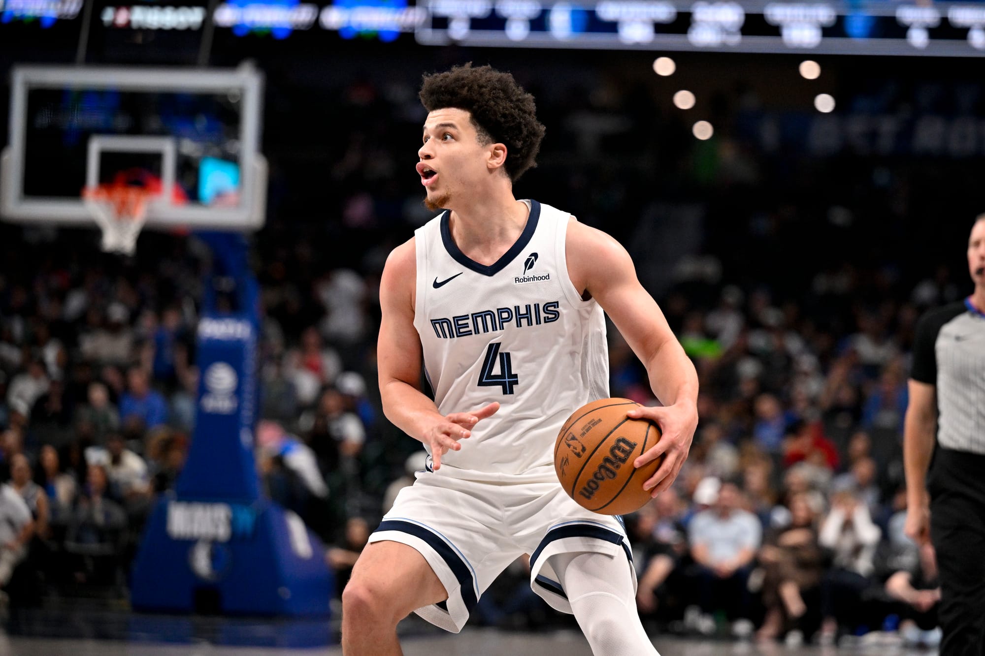 Feb 27, 2026; Dallas, Texas, USA; Memphis Grizzlies guard Walter Clayton Jr. (4) brings the ball up court against the Dallas Mavericks during the second half at the American Airlines Center.