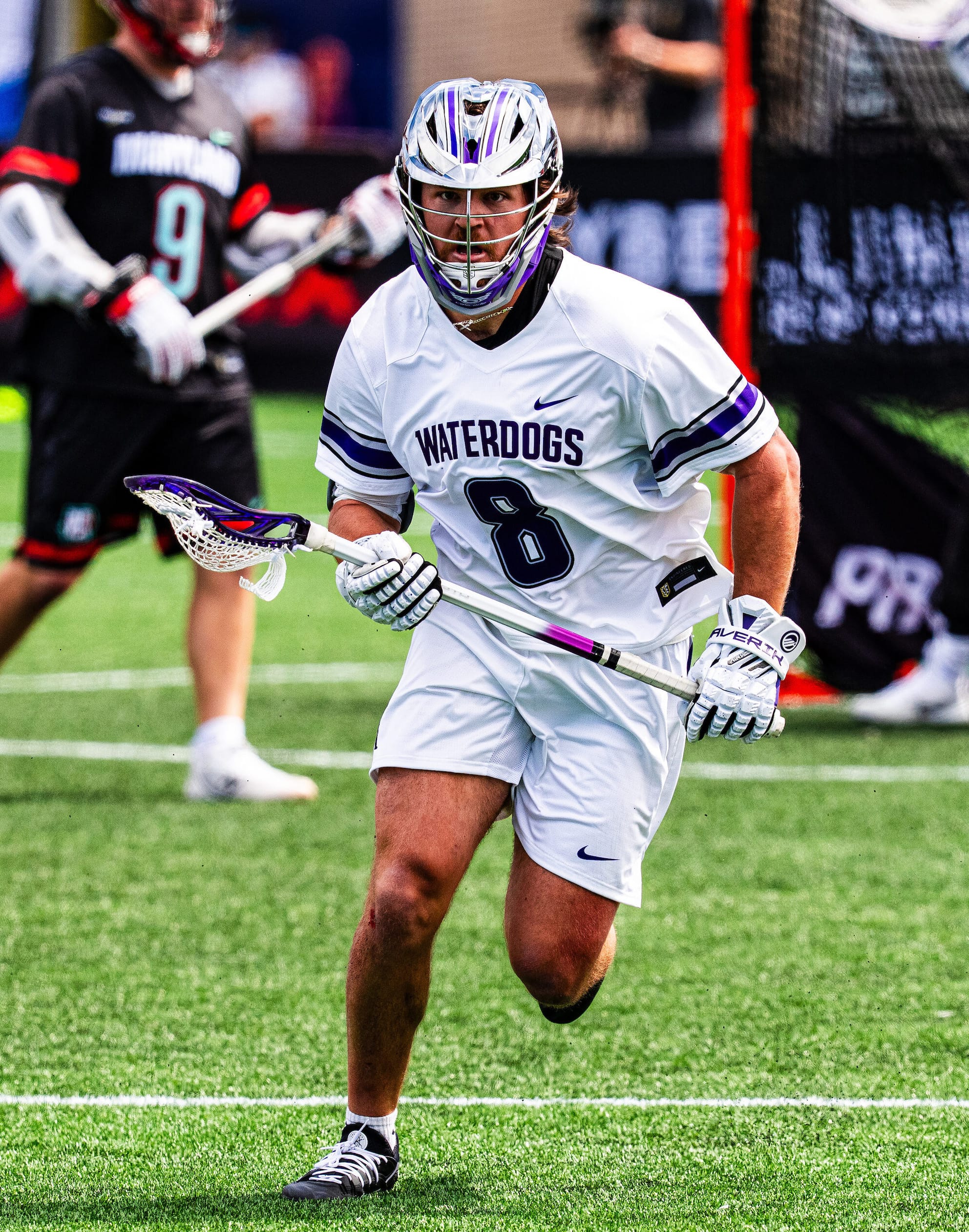 Philadelphia Waterdogs lacrosse defender Dylan Hess chases a ball during a PLL game in 2024.