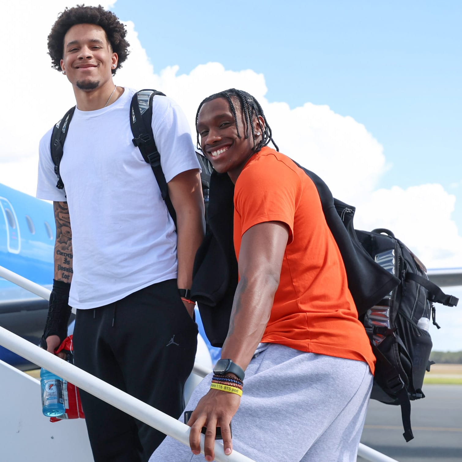 Isaiah and AJ Brown board Florida's team plane for an away game during the 2025-26 season.