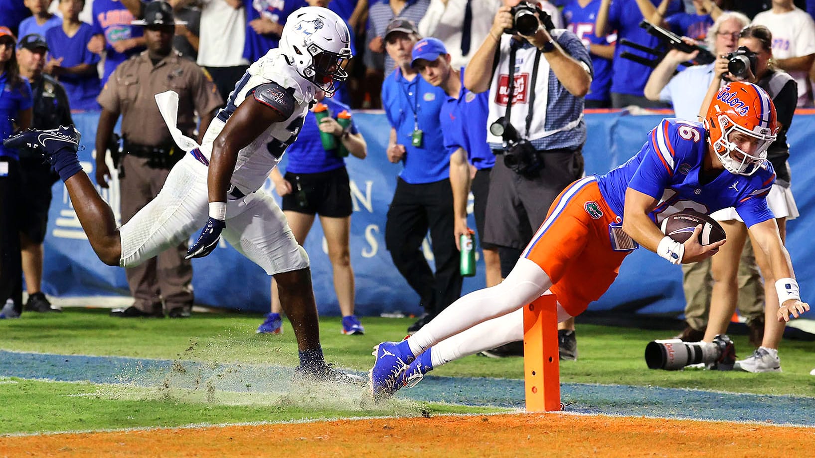 UF quarterback Aidan Warner (#16) scores a touchdown with less than a minute left of the final quarter during the Gators' game against the Samford University Bulldogs at Ben Hill Griffin Stadium in Gainesville, Fla., Saturday night, Sept.7, 2024.
