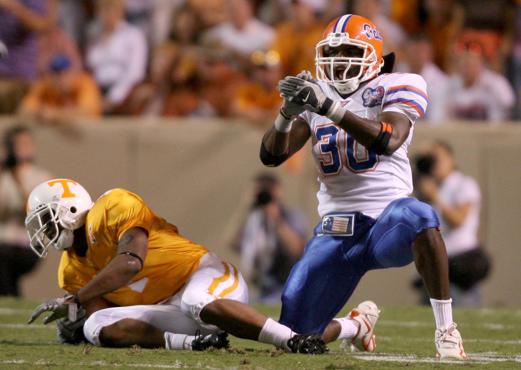 Sep 16, 2006; Knoxville, TN, USA; Florida Gators linebacker (30) Earl Everett celebrates after tackling Tennessee Volunteers wide receiver (1) Jayson Swain during the 1st quarter at Neyland Stadium in Knoxville, TN.