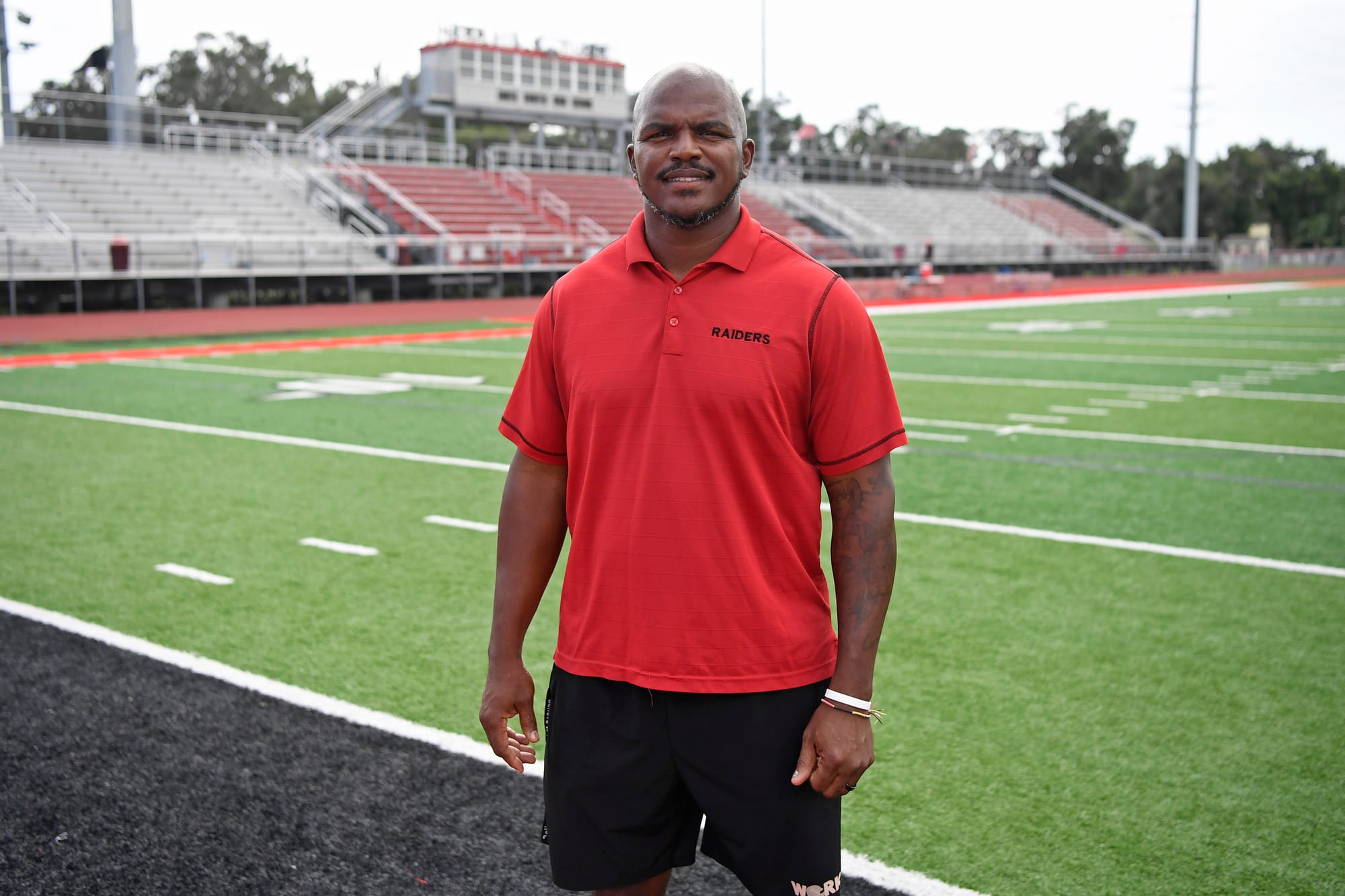 Earl Everett poses on the field on Monday, Sept. 14, 2026, at South Sumter High School in Bushnell, Fla.